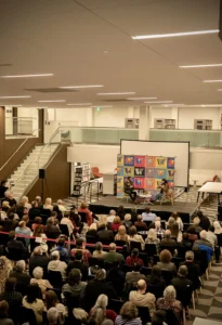 Audience attending library author event