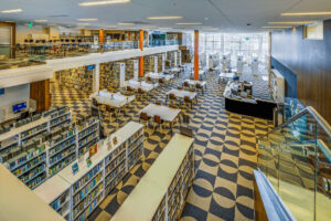 Renovated library with bookshelves and seating