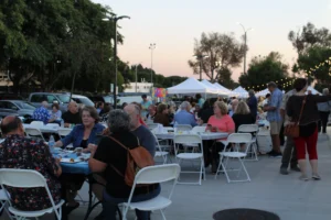 Booktoberfest 2023 – Community members dining outdoors