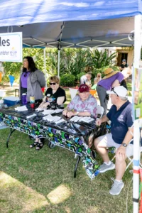 Community Members At Event Table